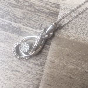 Diamond Necklace has 1 tiny real diamond in middle